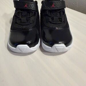 Jordan Kids Black and White Sneakers with Red Accents